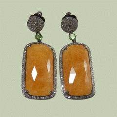 Ohrringe aus Diamanten und Edelstein